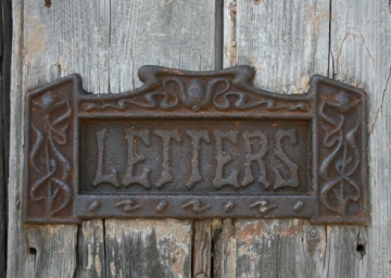 This photo of a mail slot was taken by photographer Steve Woods of Colchester, UK; it serves as an invitation to letter writers (personal or business) who require STATIONERY!